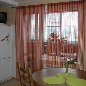 Нитяные шторы: виды, фото в интерьере, правила ухода