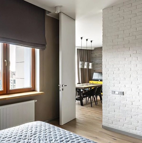 Римские шторы в интерьере в стиле лофт – это уникальное сочетание выдержанности и элегантности.