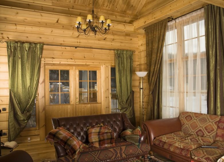 Зеленые шторы в интерьере: фото дизайнов гостиных, спален и кухонь