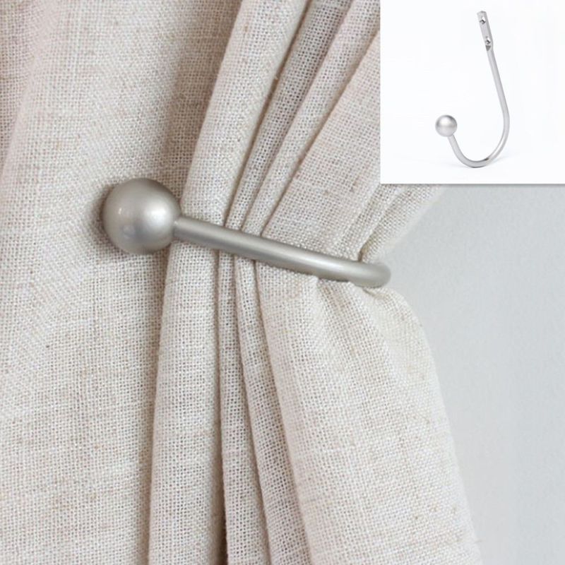 Оформление окна в гостиной шторами в современном стиле: дизайн большого и маленького окна