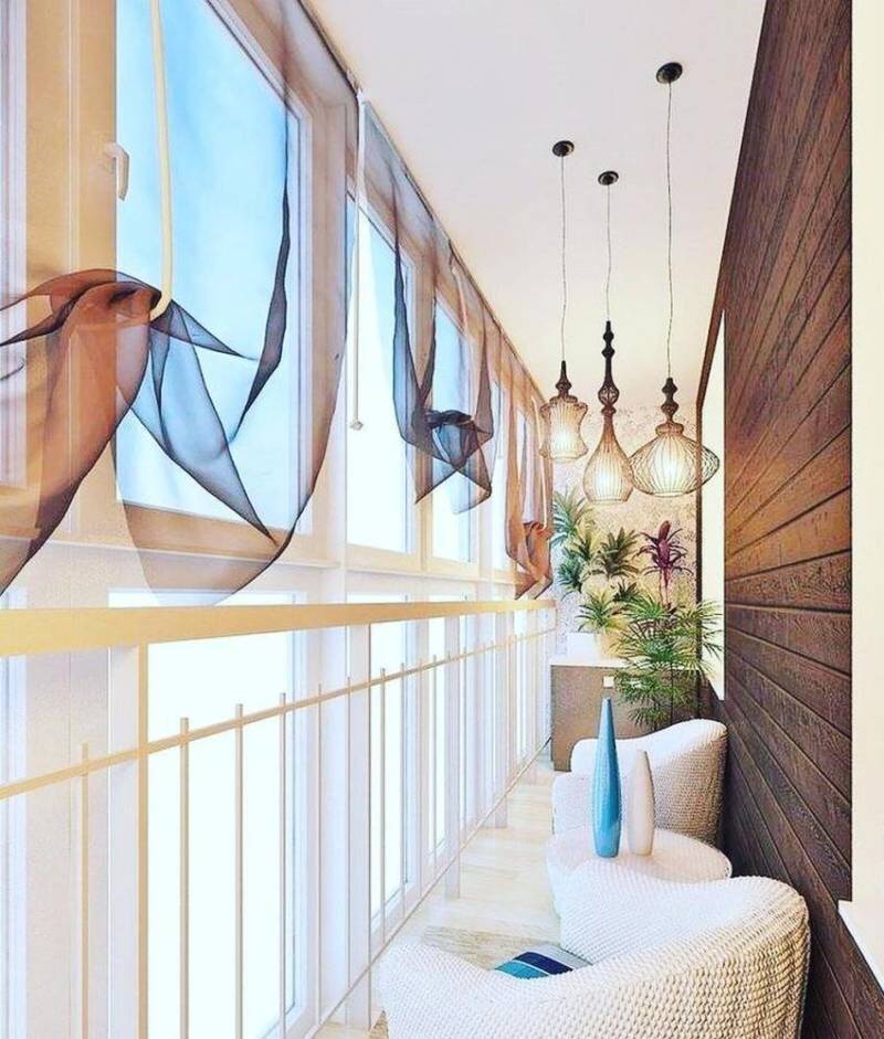 Шторы на балкон - современные варианты на раздвижные окна, выбор тюля, гардин, жалюзи, римских и рулонных штор